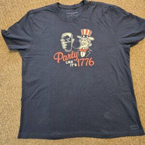 Life is Good brand graphic t-shirt, specifically a "Crusher Tee" featuring a "P